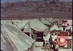 Image of army camp destroyed by atomic bomb blast test Nevada United States USA, 1955, second 8 stock footage video 65675078370