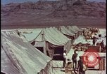 Image of army camp destroyed by atomic bomb blast test Nevada United States USA, 1955, second 9 stock footage video 65675078370