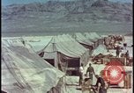 Image of army camp destroyed by atomic bomb blast test Nevada United States USA, 1955, second 10 stock footage video 65675078370