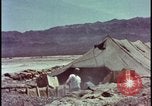 Image of army camp destroyed by atomic bomb blast test Nevada United States USA, 1955, second 12 stock footage video 65675078370