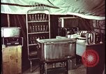 Image of army camp destroyed by atomic bomb blast test Nevada United States USA, 1955, second 17 stock footage video 65675078370