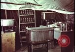 Image of army camp destroyed by atomic bomb blast test Nevada United States USA, 1955, second 18 stock footage video 65675078370
