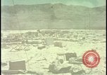Image of army camp destroyed by atomic bomb blast test Nevada United States USA, 1955, second 36 stock footage video 65675078370