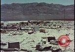 Image of army camp destroyed by atomic bomb blast test Nevada United States USA, 1955, second 38 stock footage video 65675078370
