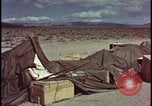 Image of army camp destroyed by atomic bomb blast test Nevada United States USA, 1955, second 48 stock footage video 65675078370
