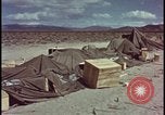 Image of army camp destroyed by atomic bomb blast test Nevada United States USA, 1955, second 55 stock footage video 65675078370