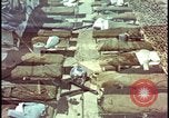 Image of army camp destroyed by atomic bomb blast test Nevada United States USA, 1955, second 56 stock footage video 65675078370
