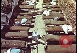 Image of army camp destroyed by atomic bomb blast test Nevada United States USA, 1955, second 57 stock footage video 65675078370