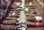 Image of army camp destroyed by atomic bomb blast test Nevada United States USA, 1955, second 58 stock footage video 65675078370