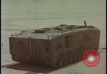 Image of LVT military transports hit by atomic bomb Nevada United States USA, 1955, second 1 stock footage video 65675078372