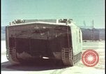 Image of LVT military transports hit by atomic bomb Nevada United States USA, 1955, second 5 stock footage video 65675078372