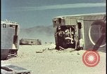 Image of LVT military transports hit by atomic bomb Nevada United States USA, 1955, second 32 stock footage video 65675078372