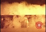 Image of atomic bomb test blast destroying buildings Nevada United States USA, 1955, second 22 stock footage video 65675078373