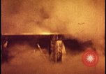 Image of atomic bomb test blast destroying buildings Nevada United States USA, 1955, second 24 stock footage video 65675078373