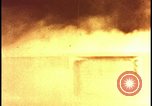 Image of atomic bomb test blast destroying buildings Nevada United States USA, 1955, second 31 stock footage video 65675078373