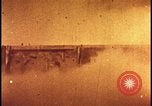 Image of atomic bomb test blast destroying buildings Nevada United States USA, 1955, second 34 stock footage video 65675078373