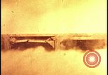 Image of atomic bomb test blast destroying buildings Nevada United States USA, 1955, second 36 stock footage video 65675078373