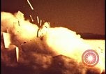 Image of atomic bomb test blast destroying buildings Nevada United States USA, 1955, second 42 stock footage video 65675078373