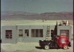 Image of atomic bomb blast hitting test building Nevada United States USA, 1955, second 1 stock footage video 65675078374