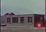 Image of atomic bomb blast hitting test building Nevada United States USA, 1955, second 11 stock footage video 65675078374