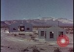 Image of atomic bomb blast hitting test building Nevada United States USA, 1955, second 13 stock footage video 65675078374