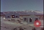 Image of atomic bomb blast hitting test building Nevada United States USA, 1955, second 14 stock footage video 65675078374