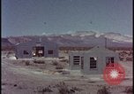 Image of atomic bomb blast hitting test building Nevada United States USA, 1955, second 15 stock footage video 65675078374