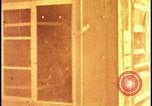 Image of atomic bomb blast hitting test building Nevada United States USA, 1955, second 16 stock footage video 65675078374