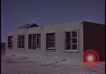 Image of atomic bomb blast hitting test building Nevada United States USA, 1955, second 21 stock footage video 65675078374