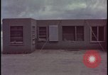 Image of atomic bomb blast hitting test building Nevada United States USA, 1955, second 36 stock footage video 65675078374