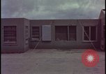 Image of atomic bomb blast hitting test building Nevada United States USA, 1955, second 38 stock footage video 65675078374