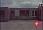 Image of atomic bomb blast hitting test building Nevada United States USA, 1955, second 39 stock footage video 65675078374
