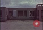 Image of atomic bomb blast hitting test building Nevada United States USA, 1955, second 40 stock footage video 65675078374