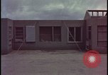 Image of atomic bomb blast hitting test building Nevada United States USA, 1955, second 41 stock footage video 65675078374