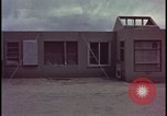 Image of atomic bomb blast hitting test building Nevada United States USA, 1955, second 43 stock footage video 65675078374