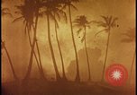 Image of atomic bomb burning palm trees Nevada United States USA, 1955, second 42 stock footage video 65675078377