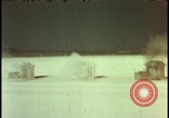 Image of atomic bomb shock wave hits huts Nevada United States USA, 1955, second 28 stock footage video 65675078378