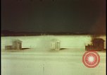 Image of atomic bomb shock wave hits huts Nevada United States USA, 1955, second 29 stock footage video 65675078378