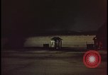 Image of atomic bomb shock wave hits huts Nevada United States USA, 1955, second 34 stock footage video 65675078378