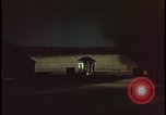 Image of atomic bomb shock wave hits huts Nevada United States USA, 1955, second 35 stock footage video 65675078378