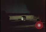 Image of atomic bomb shock wave hits huts Nevada United States USA, 1955, second 36 stock footage video 65675078378