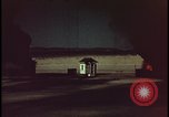 Image of atomic bomb shock wave hits huts Nevada United States USA, 1955, second 38 stock footage video 65675078378