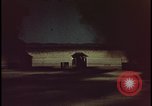 Image of atomic bomb shock wave hits huts Nevada United States USA, 1955, second 40 stock footage video 65675078378