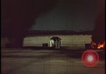 Image of atomic bomb shock wave hits huts Nevada United States USA, 1955, second 41 stock footage video 65675078378