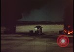 Image of atomic bomb shock wave hits huts Nevada United States USA, 1955, second 43 stock footage video 65675078378