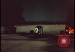 Image of atomic bomb shock wave hits huts Nevada United States USA, 1955, second 45 stock footage video 65675078378