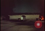 Image of atomic bomb shock wave hits huts Nevada United States USA, 1955, second 46 stock footage video 65675078378