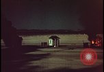 Image of atomic bomb shock wave hits huts Nevada United States USA, 1955, second 49 stock footage video 65675078378
