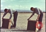 Image of atomic bomb testing of combustible insulation samples Nevada United States USA, 1955, second 4 stock footage video 65675078379