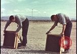 Image of atomic bomb testing of combustible insulation samples Nevada United States USA, 1955, second 5 stock footage video 65675078379